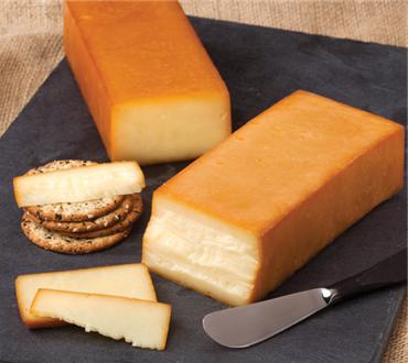 Полезен ли плавленный и копченый сыр